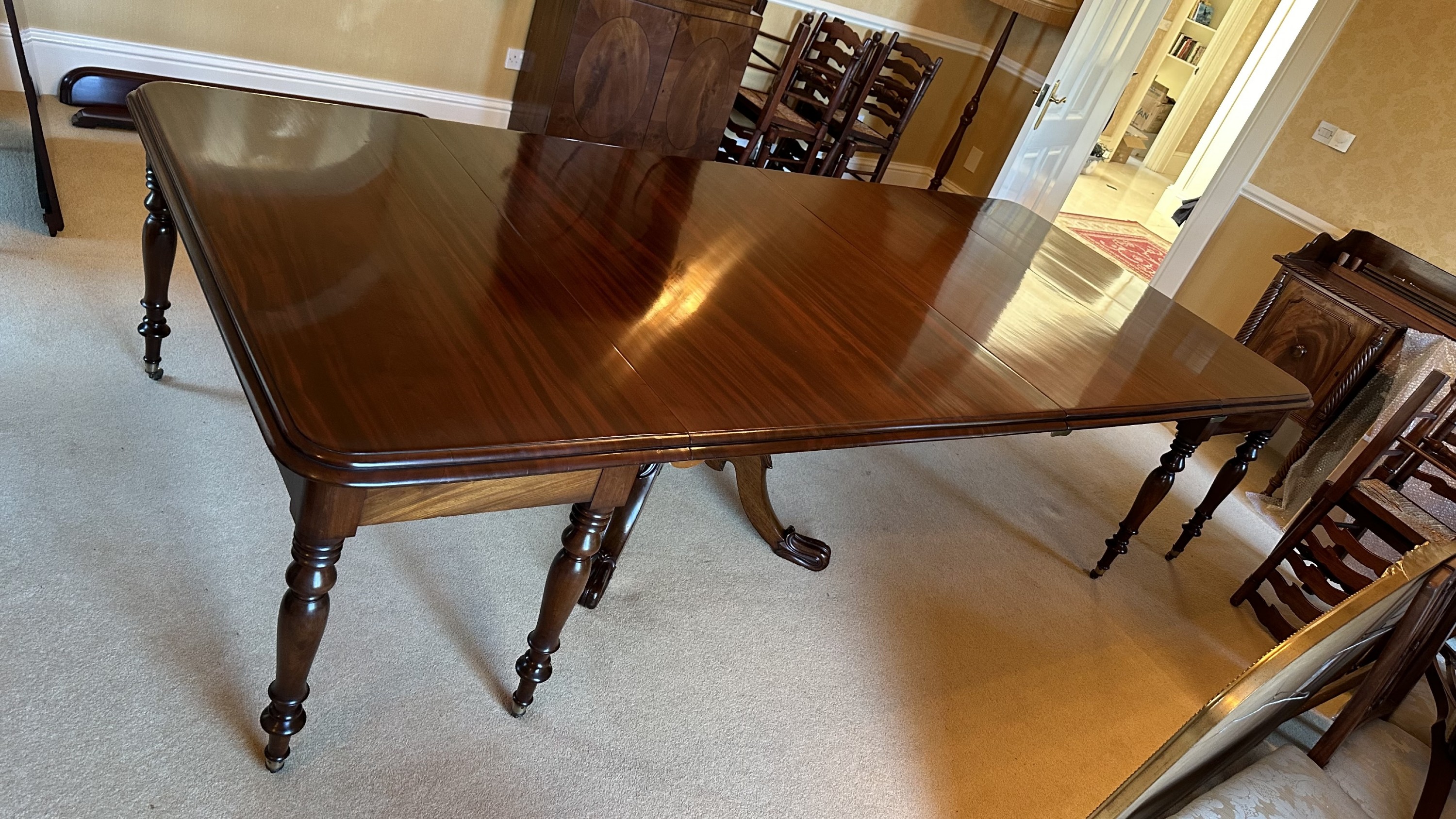 recent restoration to a large irish mahogany dining table