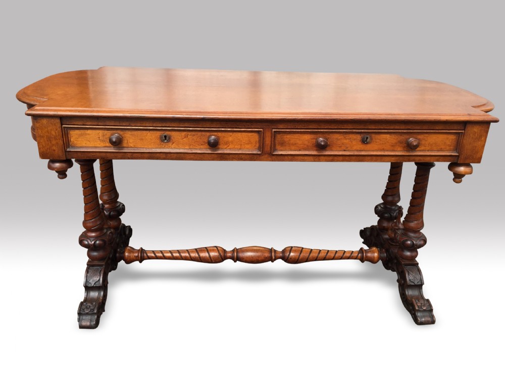 a very fine quality oak center or library table made by robert strahan co dublin