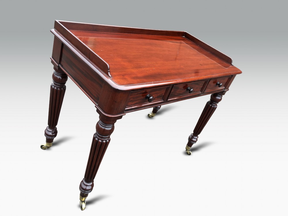 mahogany writing or dressing table attributed to gillows stamped by m wilson 68 great queen street london