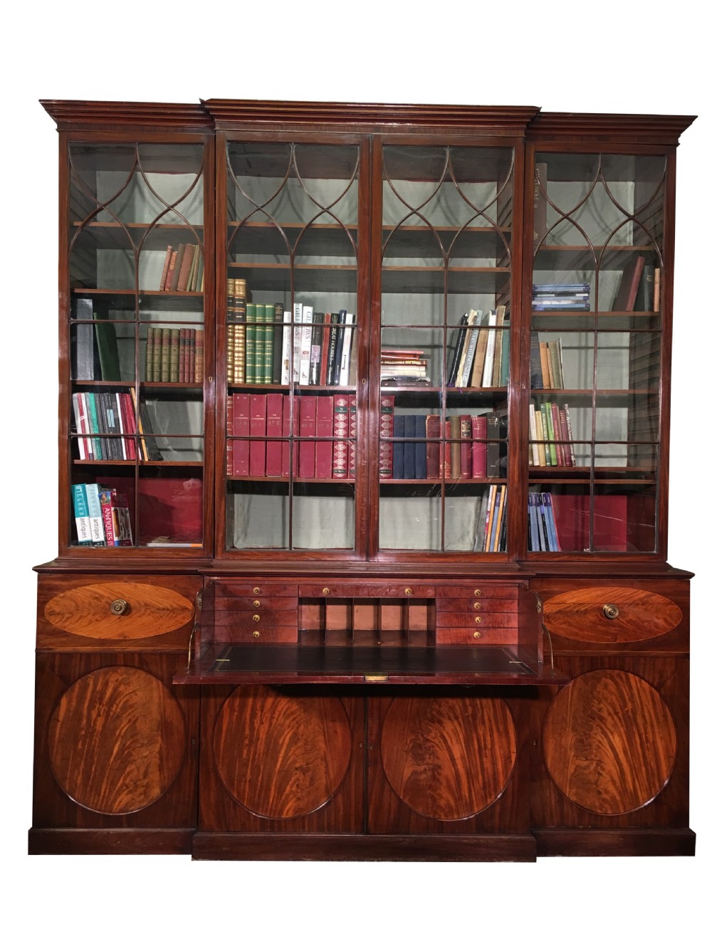 a superb important george iii mahogany breakfront secretaire bookcase of magnificent proportions