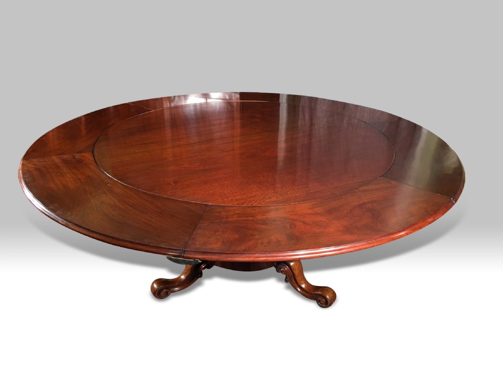 a superb rare william iv expanding circular mahogany dining table