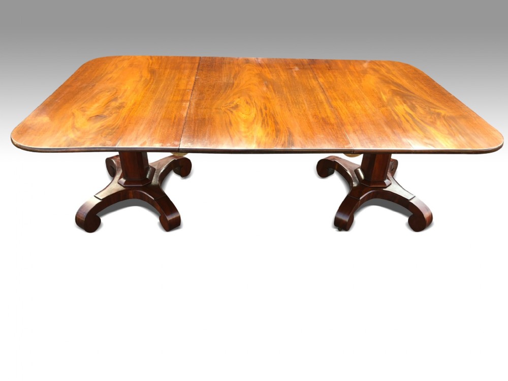 a fine regency mahogany twin pedestal dining table