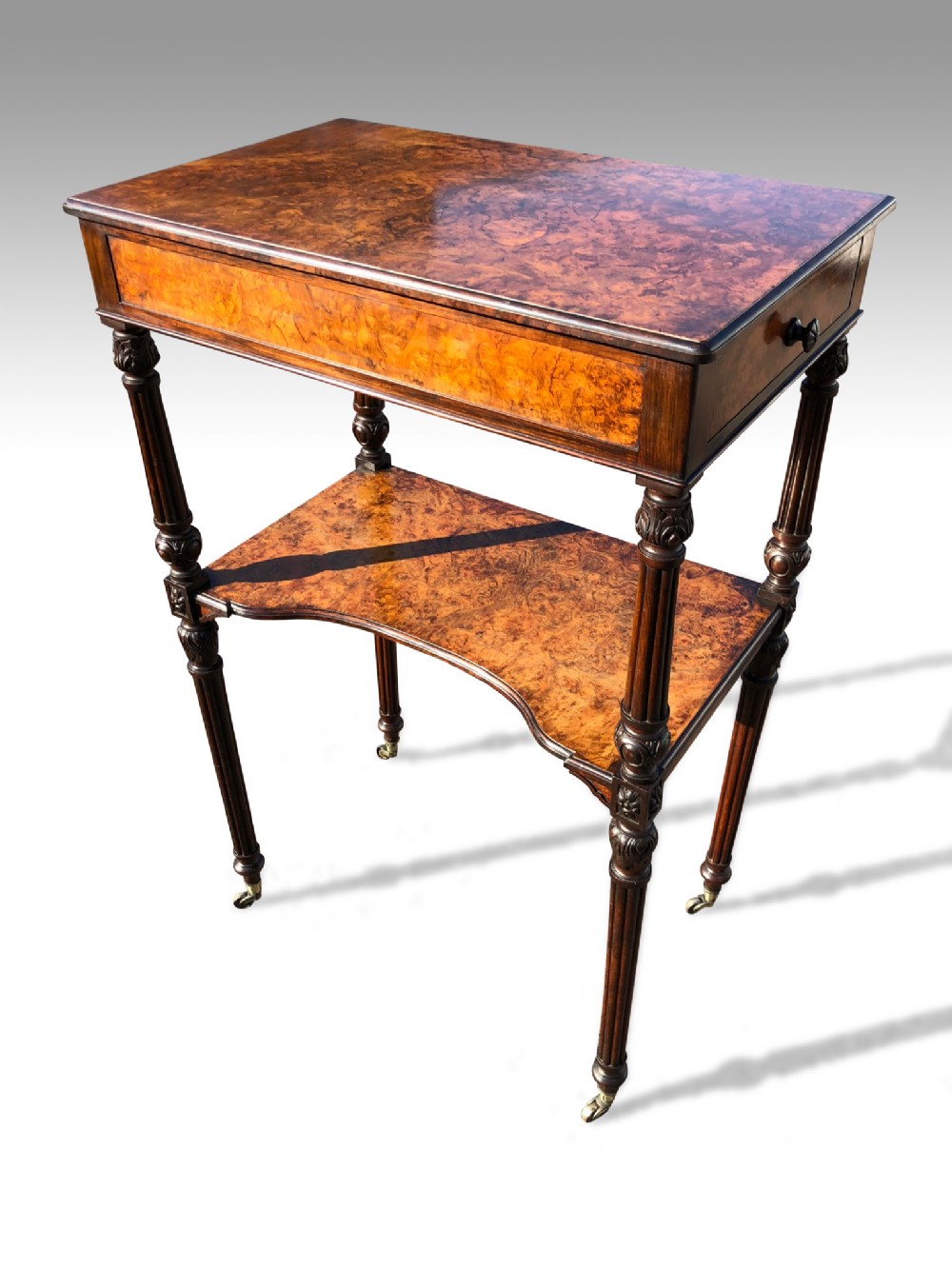 a wonderful mid 19th c walnut etegere of unusually grand proportions by holland sons