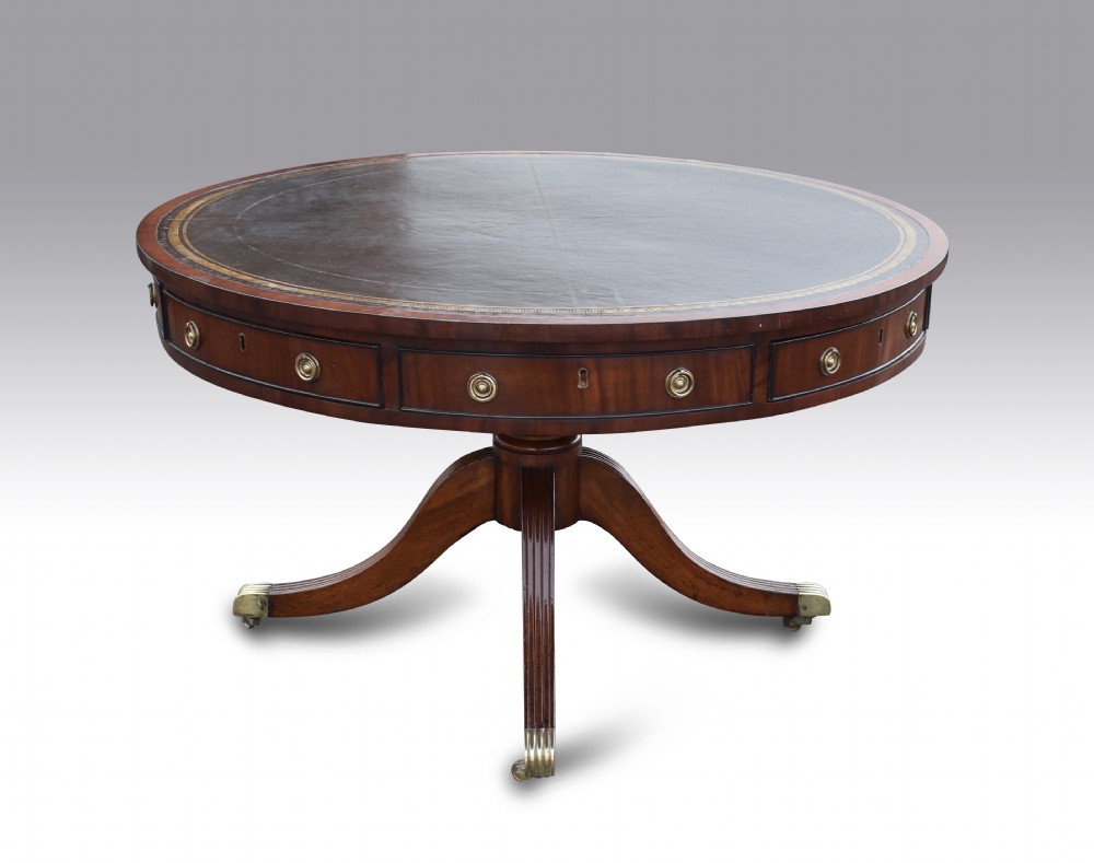 a regency mahogany ebony drum table