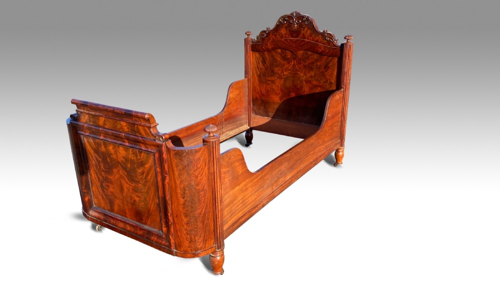 a magnificent mid 19th century mahogany childs bed