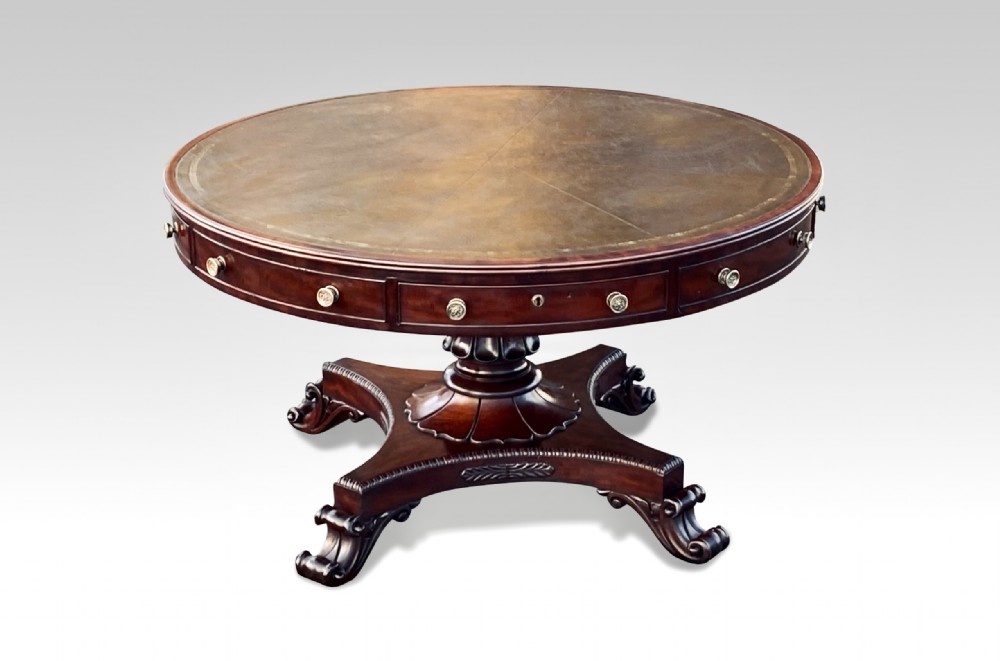 a superb irish regency period mahogany drum table in the manner of williams gibton