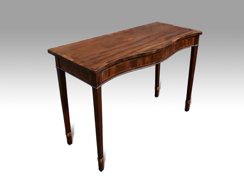 a fine george iii irish mahogany inlaid serpentine console table