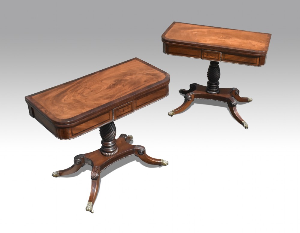 a fine pair of irish regency mahogany rosewood inlaid card tables